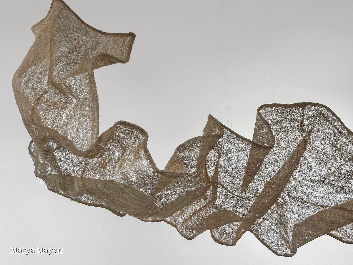 Fragile — suspended loofah installation by Marya Mayan